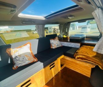 NEED TO SELL THIS WEEK - Fully green self-contained - super low mileage - cozy van