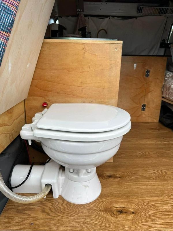 Fixed toilet in a campervan